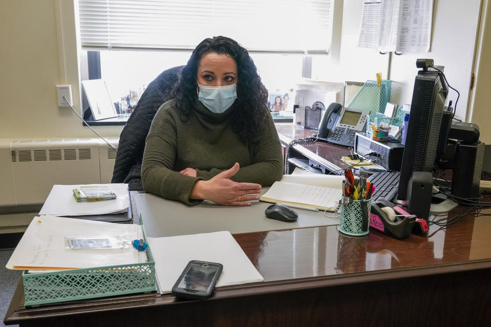 School Counseling Carli Rocha-Reaes gestures as she speaks during an interview, Thursday, Feb. 25, 2021, in Bridgeport. Conn. School counselors in many urban, high needs districts have been consumed with efforts to help students engage with their schoolwork since the pandemic hit. (AP Photo/Mary Altaffer)