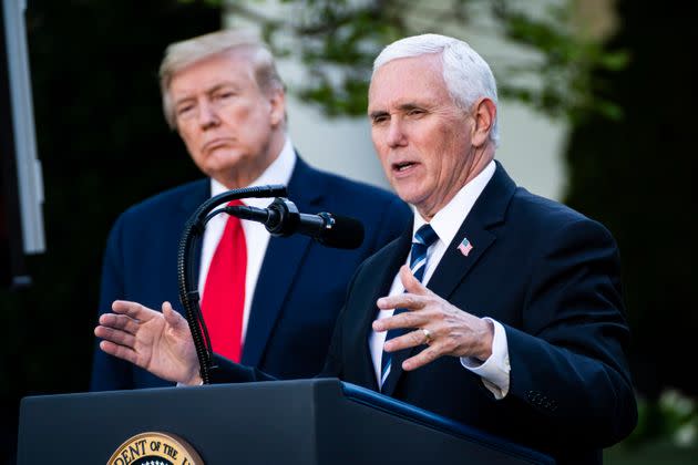Donald Trump, left, asked Mike Pence, right, if he'd been scared during the Jan. 6 insurrection, Pence claimed in his new book. (Photo: The Washington Post via Getty Images)