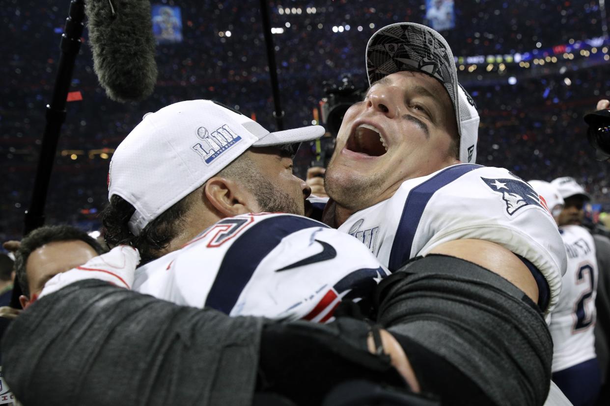 New England Patriots' Kyle Van Noy, left, and Rob Gronkowski, right, celebrate after a Super Bowl LIII win. (AP)