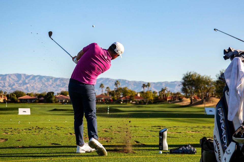 Xander Schauffele warms up on the driving range before playing round two of The American Express on the Nicklaus Tournament Course at PGA West in La Quinta, Calif., Friday, Jan. 20, 2023. 