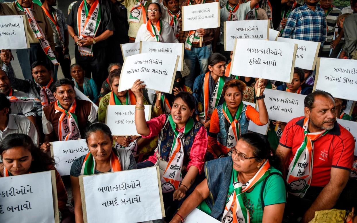 Thousands took to the streets across India to protest the brutal attack in Hyderabad - AFP