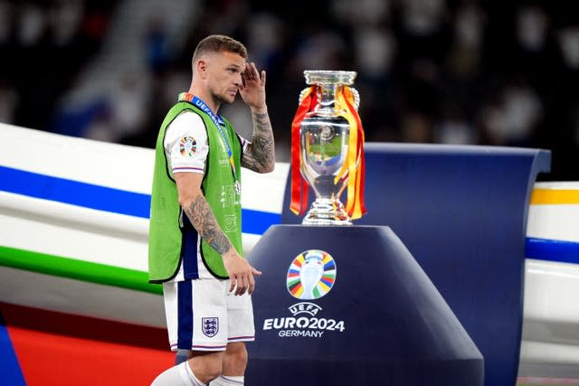 England's Kieran Trippier walks past the Euro 2024 trophy after defeat by Spain in the final