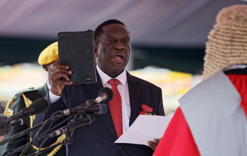 <p>Emmerson Mnangagwa is sworn in as President at the presidential inauguration ceremony in the capital Harare, Zimbabwe Friday, Nov. 24, 2017. (Photo: Ben Curtis/AP) </p>