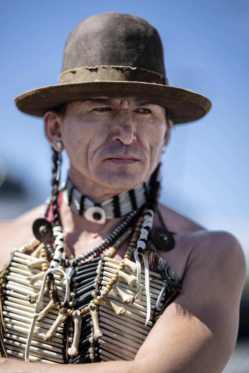 Eugene Brave Rock is a Canadian actor and stunt man who was present at the 40th anniversary of the Gathering of Nations Pow Wow in Albuquerque, N.M., Friday, April 28, 2023. Tens of thousands of people gathered in New Mexico on Friday for what organizers bill as the largest powwow in North America. (AP Photo/Roberto E. Rosales)