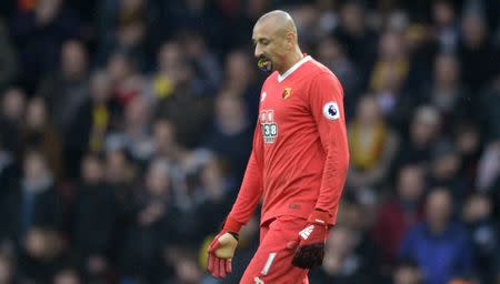 Football Soccer Britain - Watford v Everton - Premier League - Vicarage Road - 10/12/16 Watford's Heurelho Gomes with a mouthguard with the Brazilian flag on it Action Images via Reuters / Alan Walter Livepic EDITORIAL USE ONLY. No use with unauthorized audio, video, data, fixture lists, club/league logos or "live" services. Online in-match use limited to 45 images, no video emulation. No use in betting, games or single club/league/player publications. Please contact your account representative for further details.