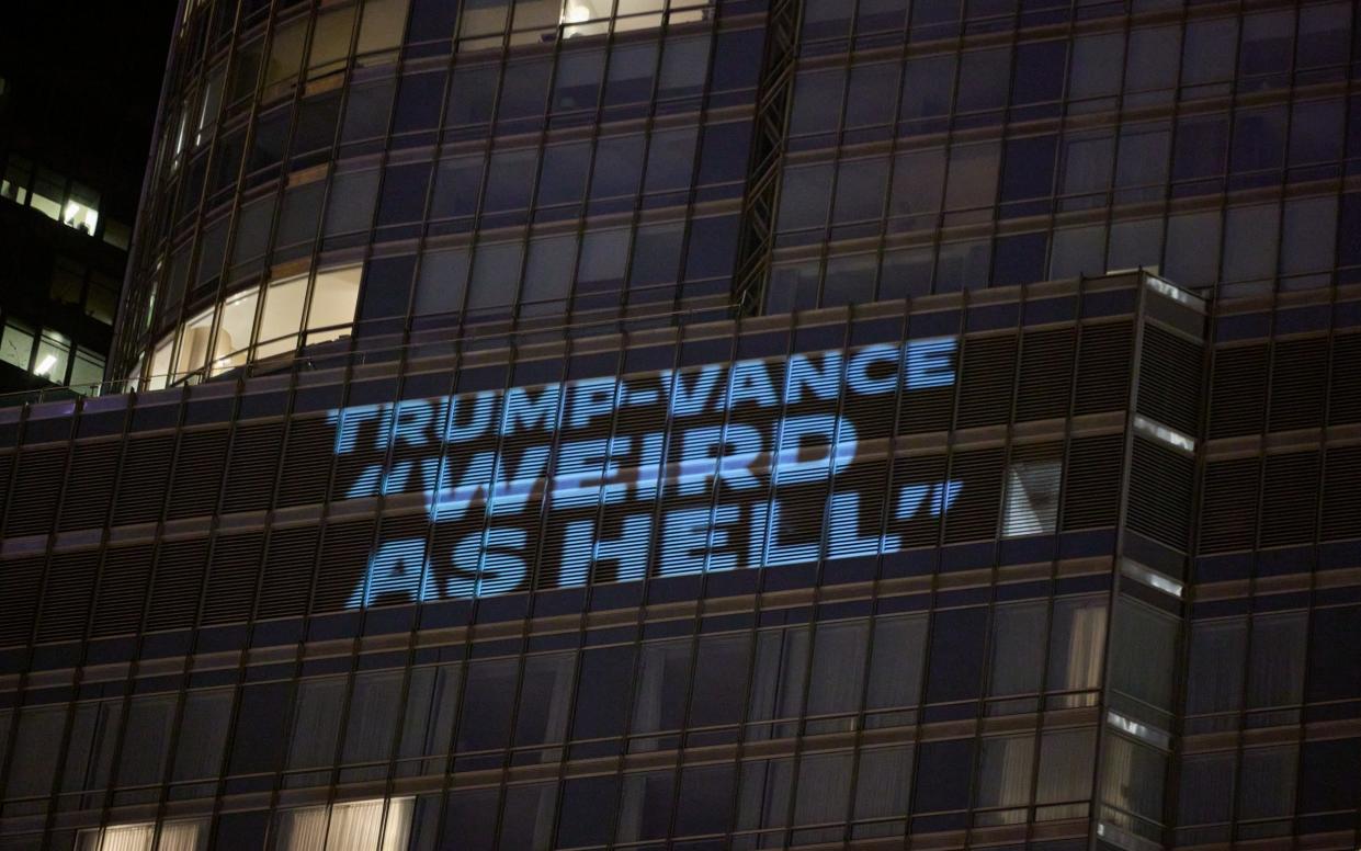 Deomcratic National Committee projects a message onto Trump's hotel in Chicago