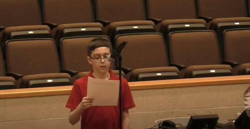 Nichols Middle School seventh grader Liam Morrison speaks to the school committee on April 13, 2023.