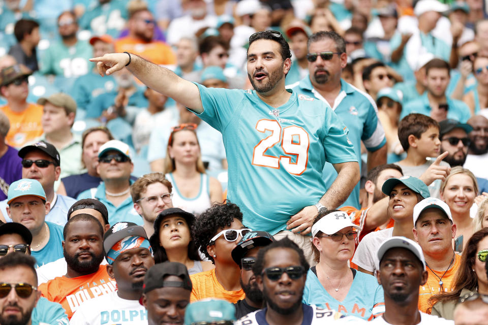 MIAMI, FLORIDA - SEPTEMBER 08:  A Miami Dolphins fan reacts against the Baltimore Ravens at Hard Rock Stadium on September 08, 2019 in Miami, Florida. (Photo by Michael Reaves/Getty Images)