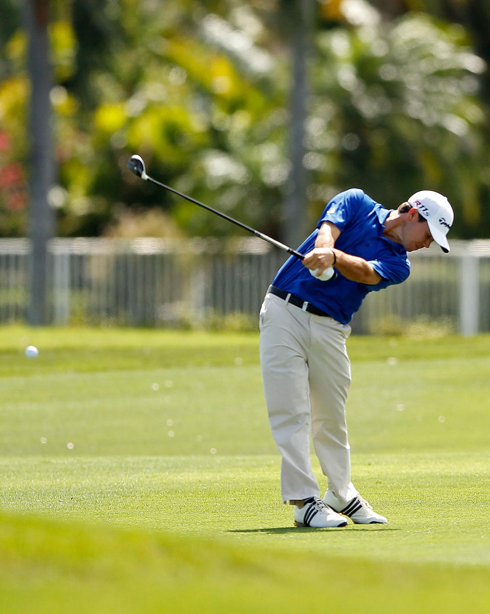 PALM BEACH GARDENS, FL - MARCH 02: Brian Harman hits his approach shot on the 18th hole on his way to posting a course record 61 during the second round of the Honda Classic at PGA National on March 2, 2012 in Palm Beach Gardens, Florida. (Photo by Mike Ehrmann/Getty Images)