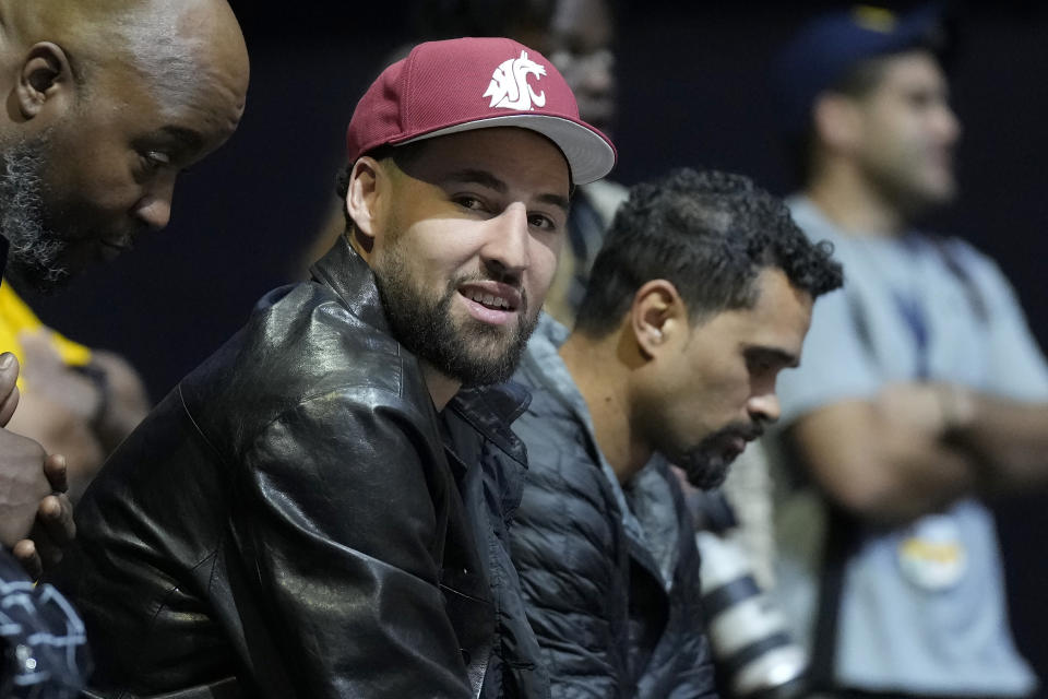 Golden State Warriors' Klay Thompson watches during the second half of an NCAA college basketball game between California and Washington State in Berkeley, Calif., Saturday, Feb. 25, 2023. (AP Photo/Jeff Chiu)