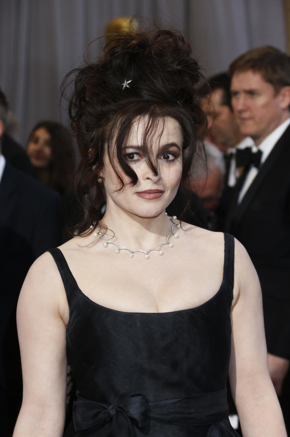 Actress Helena Bonham Carter arrives at the Oscars at the Dolby Theatre on Sunday Feb. 24, 2013, in Los Angeles. (Photo by Todd Williamson/Invision/AP)