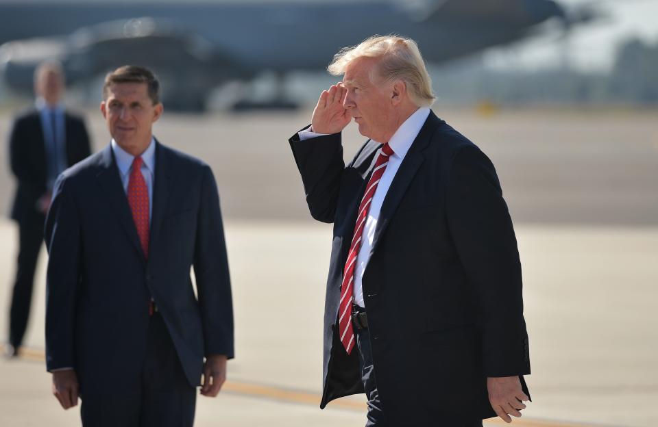 National Security Advisor Michael Flynn and President Donald Trump arrive at MacDill Air Force Base in Tampa, Florida to visit the U.S. Central Command and Specials Operations Command on Feb. 6, 2017.