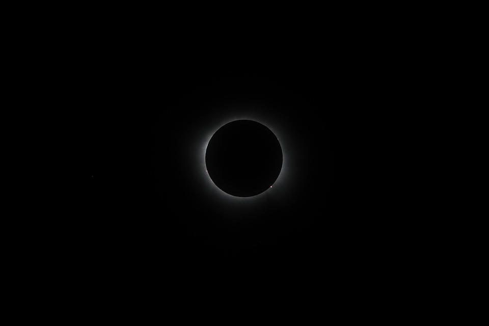 The moon crosses in front of the sun during the Great North American Eclipse on April 8, 2024 in Torreon, Mexico.  / Credit: Getty Images / Getty Images