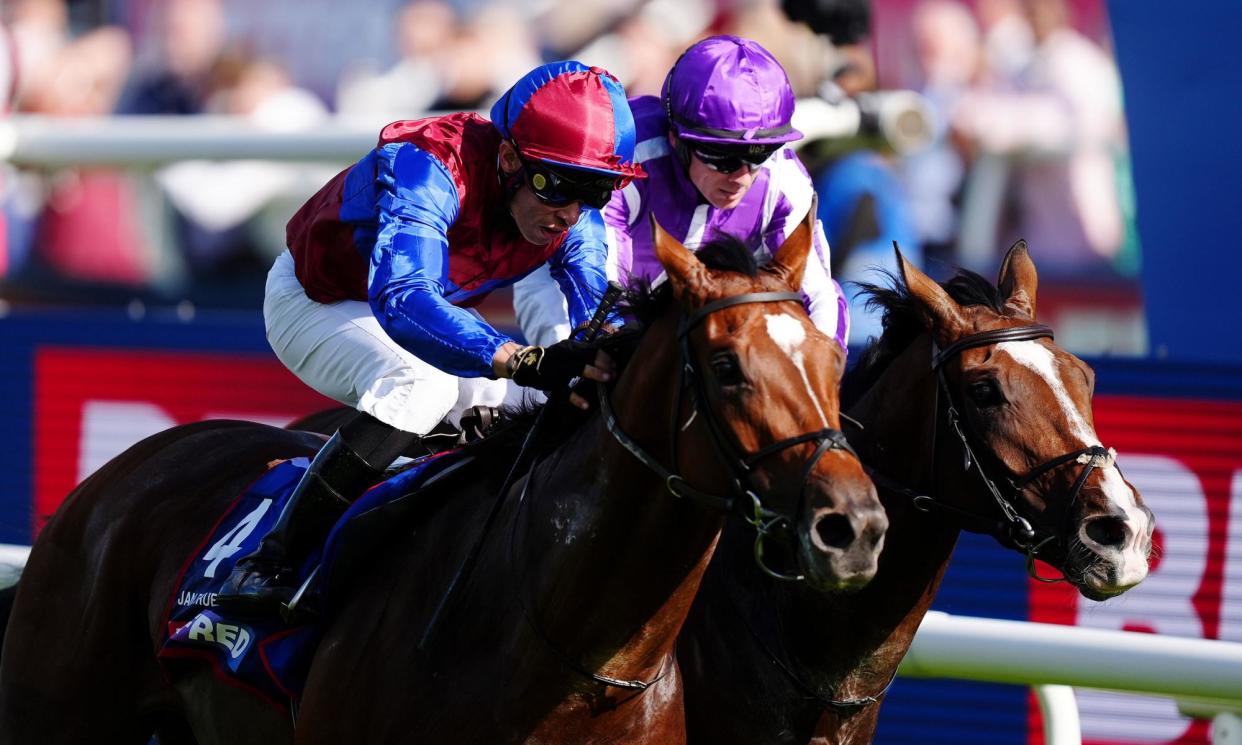 <span>Jan Brueghel, ridden by Sean Levey (left), on the way to winning the St Leger.</span><span>Photograph: Mike Egerton/PA</span>