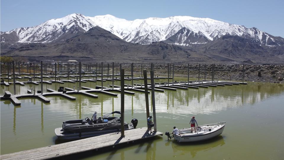 Boaters return to the Great Salt Lake Marina on April 16, 2023, in Magna, Utah. Sailors back out on the water are rejoicing after a snowy winter provided temporary reprieve to long-term drought projections facing the Great Salt Lake. (AP Photo/Rick Bowmer)