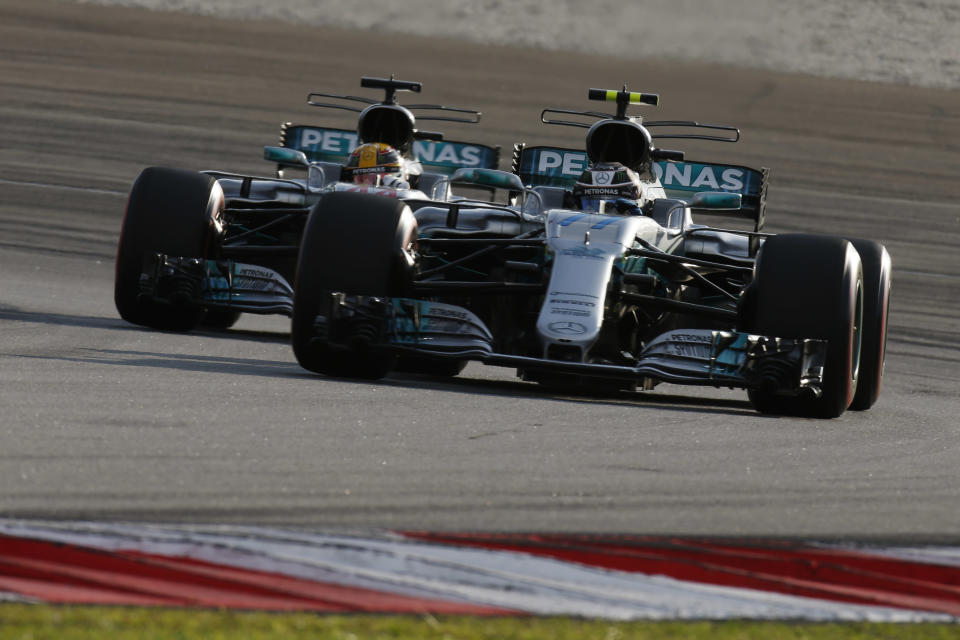 Teutonic twosome: Mercedes team-mates Valtteri Bottas and Lewis Hamilton run nose-to-tail at the 2017 Malaysian Grand Prix