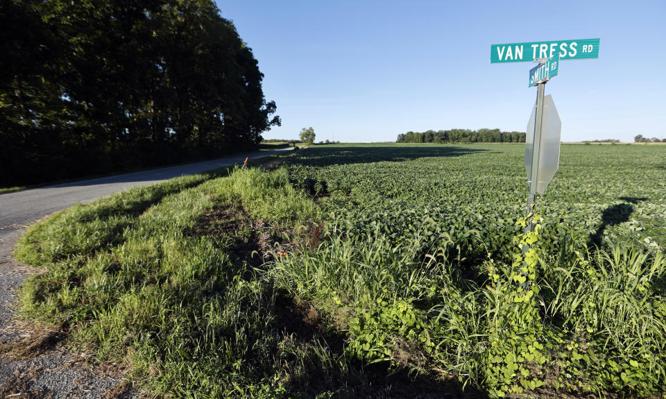 The intersection of Smith Road and Van Tress Road in Chester Township, Ohio, seen Friday, Aug. 12, 2022, near where the Ohio State Highway Patrol says a standoff took place the day before. Authorities are investigating the motives 42-year-old Ricky Shiffer, an armed man who they say tried to breach the FBI’s Cincinnati office, fled and died hours later in a rural standoff with law enforcement. (AP Photo/Paul Vernon)