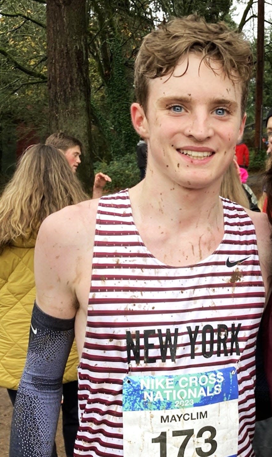 A mud-splattered Bobby Mayclim of Lakeland/Panas after he finished the 3.1-mile course during the Nike Cross Nationals championships Dec. 2, 2023 in Portland, Oregon. Mayclim was 67th out of 201 athletes who completed the course and was the first runner from New York to finish.