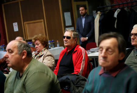 Voters listen to a speech by Fidesz candidate, Denes Galambos at a campaign forum of the right-wing party in Ercsi, Hungary, March 9, 2018. Picture taken March 9, 2018. REUTERS/Bernadett Szabo