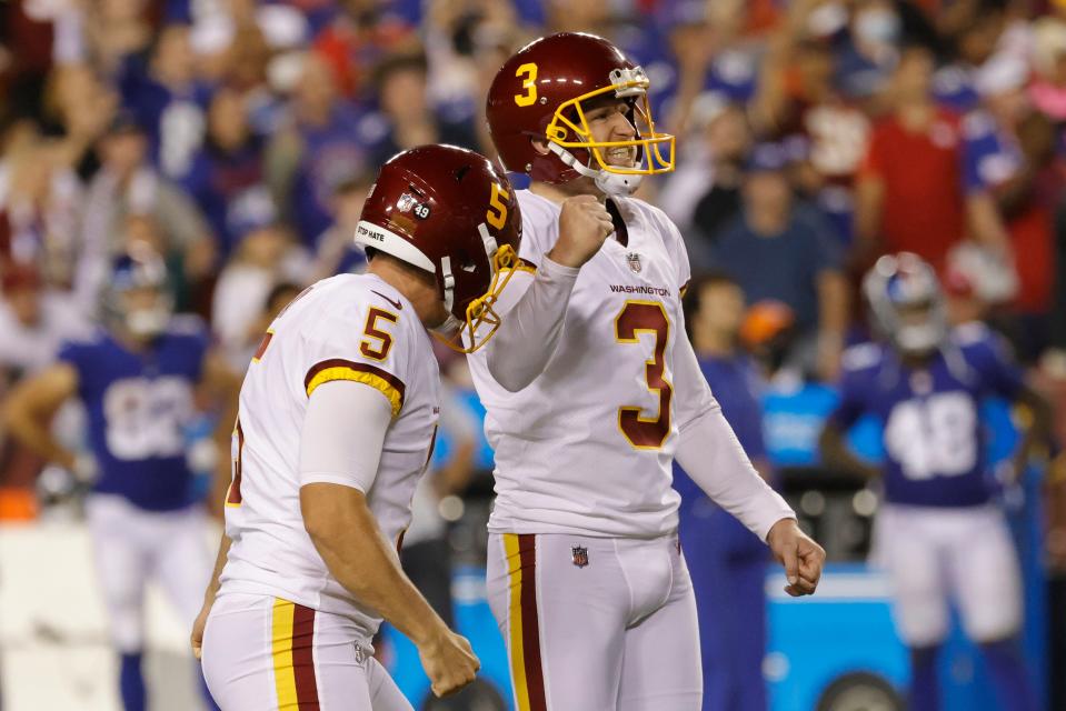 Washington kicker Dustin Hopkins celebrates with holder Tress Way, left, after his game-winning 43-yard field goal as time expired last Thursday.
