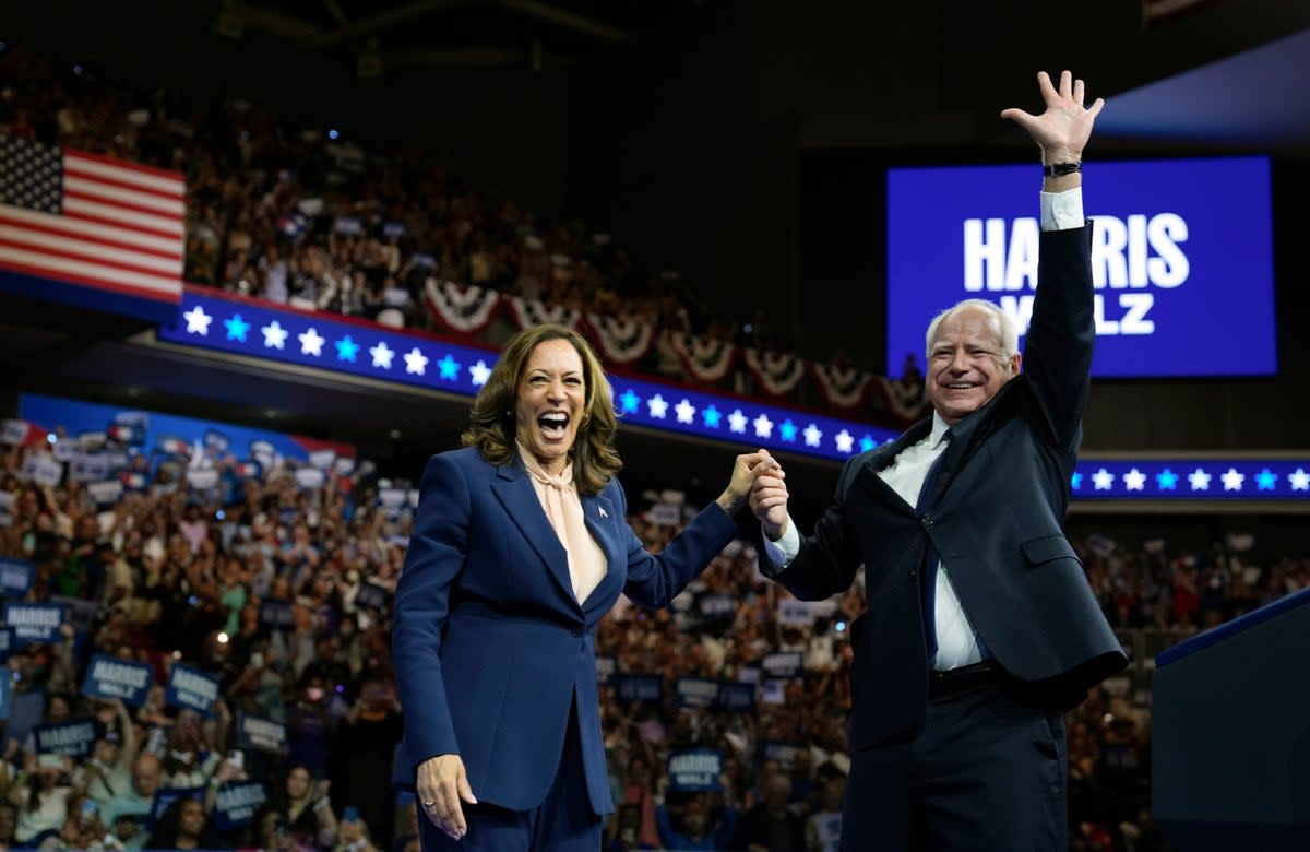 Democratic presidential nominee Vice President Kamala Harris accompanied, left, by her running mate Minnesota Gov. Tim Walz. The two are set for rallies across the US including one hours before former president Obama speaks at the DNC. (AP)