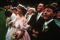 <p>Guess what's back? Pink. Flower crowns also made a mark around this time, as seen on this bridesmaid, who's lucky enough to be wearing both trends.</p>