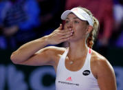 Tennis - Singapore WTA Finals Round Robin Singles - Singapore Indoor Stadium, Singapore - 25/10/2016 - Angelique Kerber of Germany celebrates after defeating Simona Halep of Romania REUTERS/Edgar Su