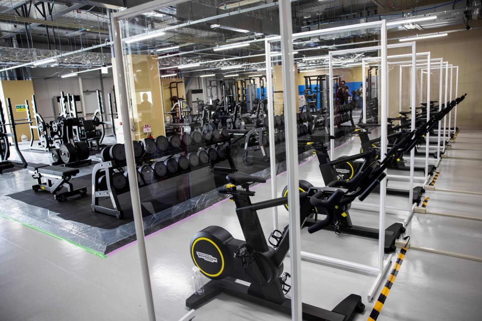 Partitions are seen installed at the fitness centre to prevent the spread of the Covid-19 coronavirus during a media tour of the Tokyo 2020 Olympic and Paralympic Village in Tokyo on June 20, 2021.