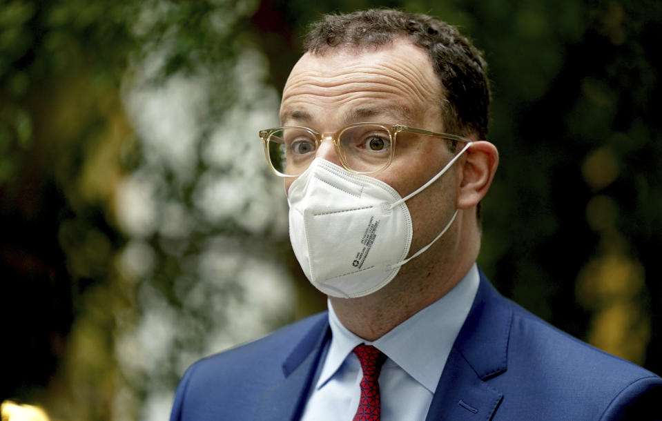 German Health Minister Jens Spahn arrives for a press conference in Berlin, Germany, Wednesday, May 12, 2021. (AP Photo/Michael Sohn)