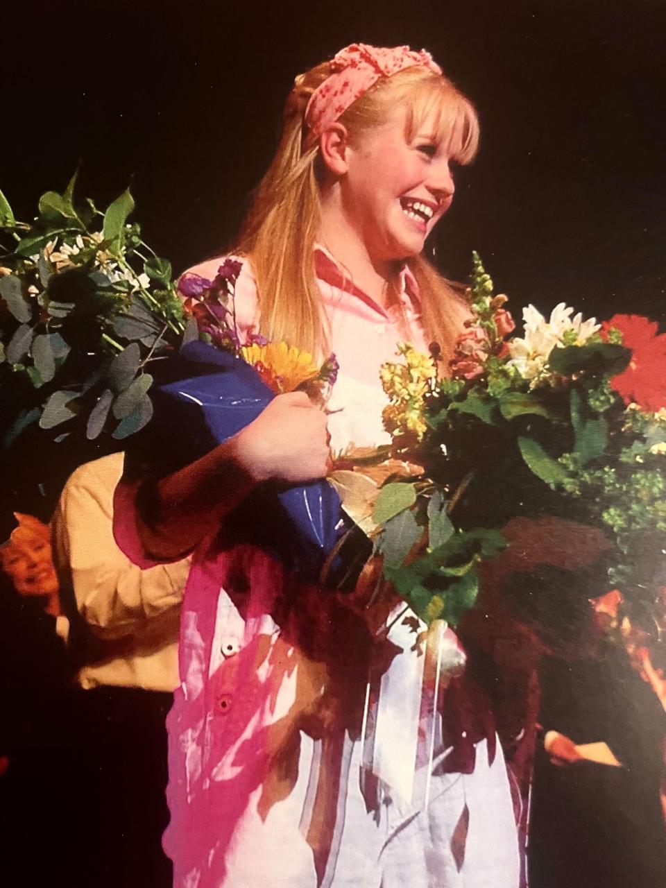 Carrie St. Louis takes a bow after winning the Open Call Talent Project at the McCallum Theatre.