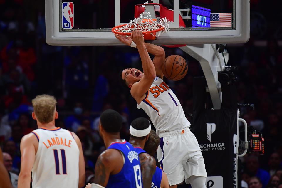 Will Devin Booker and the Phoenix Suns beat the Golden State Warriors in their NBA game on Tuesday?