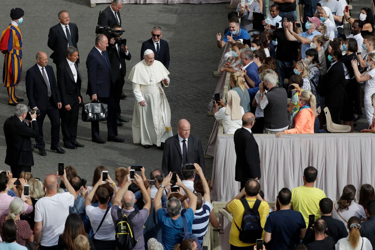 Pope Francis arrives for his general audience, the first with faithful since February when the coronavirus outbreak broke out, at the San Damaso courtyard, at the Vatican on Wednesday, Sept. 2, 2020.