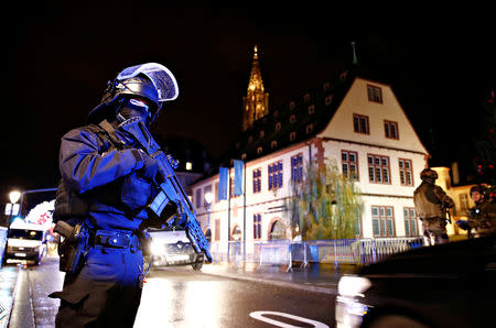 Security forces secure area where a suspect is sought after a shooting in Strasbourg, France, December 11, 2018. REUTERS/Christian Hartmann