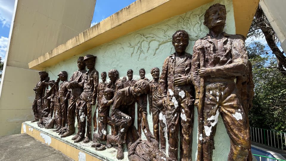 A relief depicts the 1942 Bataan Death March on the Death March Memorial in Capas, Philippines. - Brad Lendon/CNN