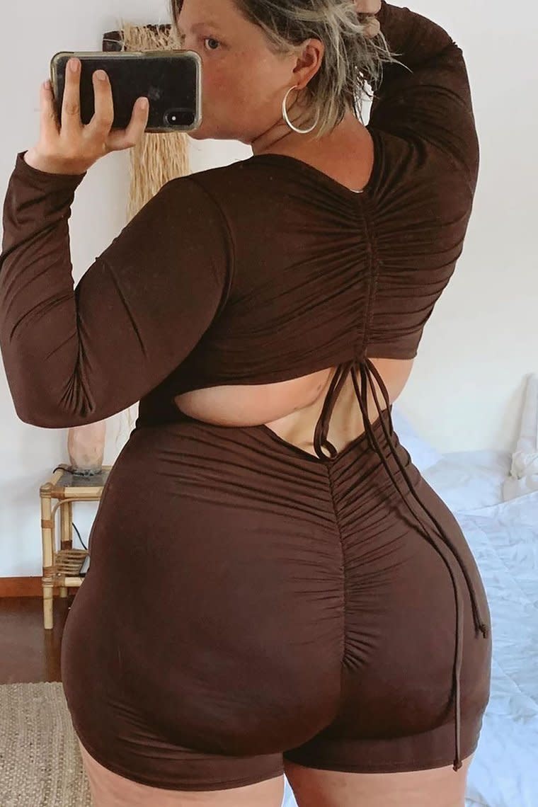 Image of woman wearing fashion nova jumpsuit