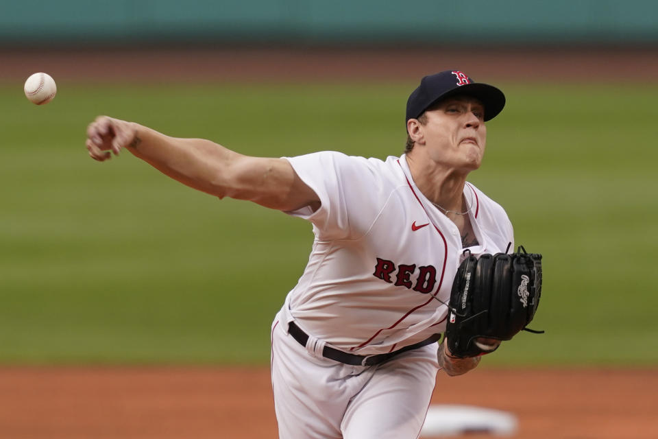 Boston Red Sox starting pitcher Tanner Houck delivers to a New York Yankees batter during the first inning of a baseball game at Fenway Park, Thursday, July 22, 2021, in Boston. (AP Photo/Elise Amendola)