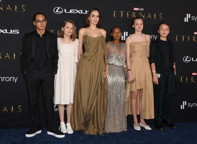 US actress Angelina Jolie and her children (L-R) Maddox, Vivienne, Zahara, Knox and Shiloh arrive for the world premiere of Marvel Studios' "Eternals" at the Dolby theatre in Los Angeles, October 18, 2021. (Photo by VALERIE MACON / AFP)