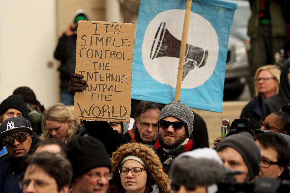 Protesters rally at FCC against repeal of net neutrality rules