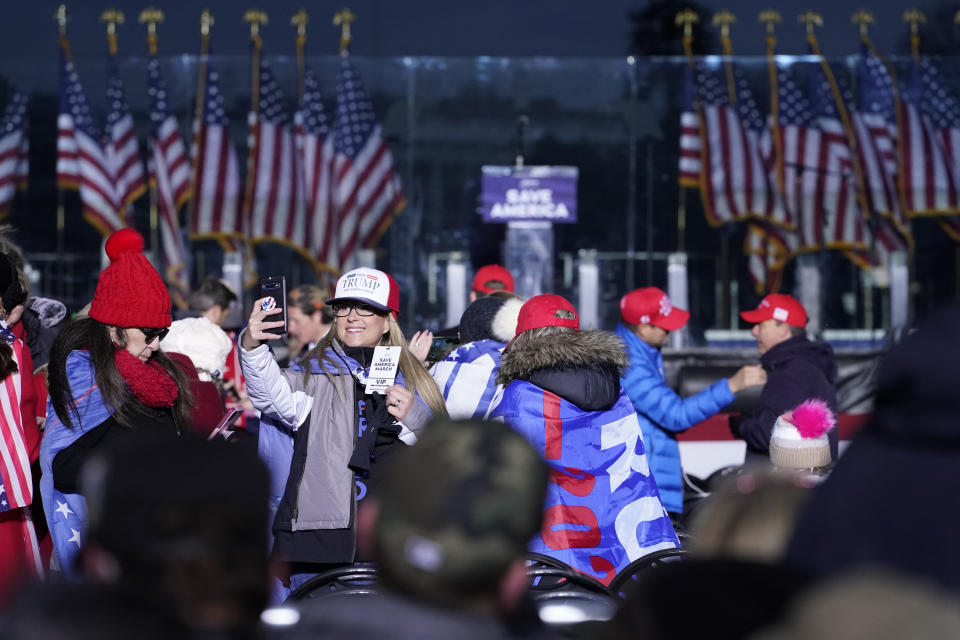 FILE - In this Jan. 6, 2021 file photo people arrive to attend a rally in support of President Donald Trump. An AP review of records finds that members of President Donald Trump’s failed campaign were key players in the Washington rally that spawned a deadly assault on the U.S. Capitol last week.(AP Photo/Jacquelyn Martin, File)