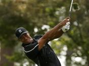 Tiger Woods of the U.S. hits off the fourth tee during second round play of the Masters golf tournament at the Augusta National Golf Course in Augusta, Georgia April 10, 2015. REUTERS/Jim Young