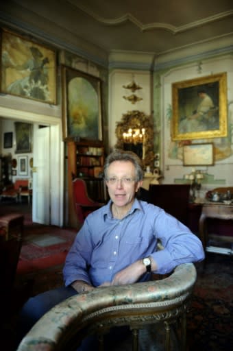 John Mucha, Alfons Mucha's grandson, poses at his apartment in Prague