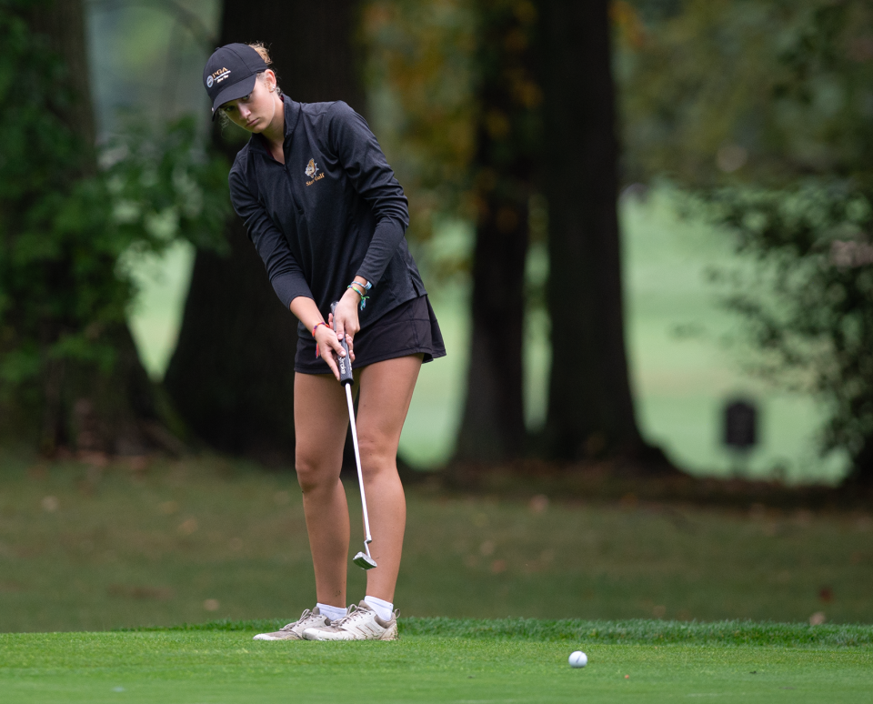 Stow's Olivia Berlingieri putts on No. 1 at the Suburban League girls golf championship hosted by Brookledge Golf Club in Cuyahoga Falls on Wednesday, Sep. 25.