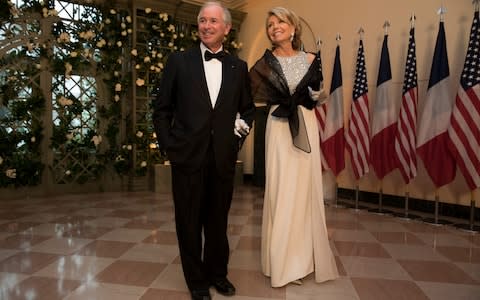 Stephen Schwarzman and his wife Christine arrive at the White House for a state dinner last year in Washington - Credit: Aaron P. Bernstein&nbsp;