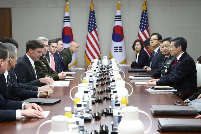 FILE PHOTO: U.S. Defense Secretary Mark Esper meets with South Korean Defense Minister Jeong Kyeong-doo (R) in Seoul