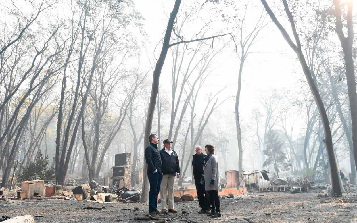 Donald Trump visited the fire-ravaged state - AFP