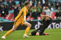 Germany's Thomas Mueller reacts after a miss in front of England's goalkeeper Jordan Pickford during the Euro 2020 soccer championship round of 16 match between England and Germany at Wembley Stadium in England, Tuesday June 29, 2021. (Justin Tallis, Pool Photo via AP)