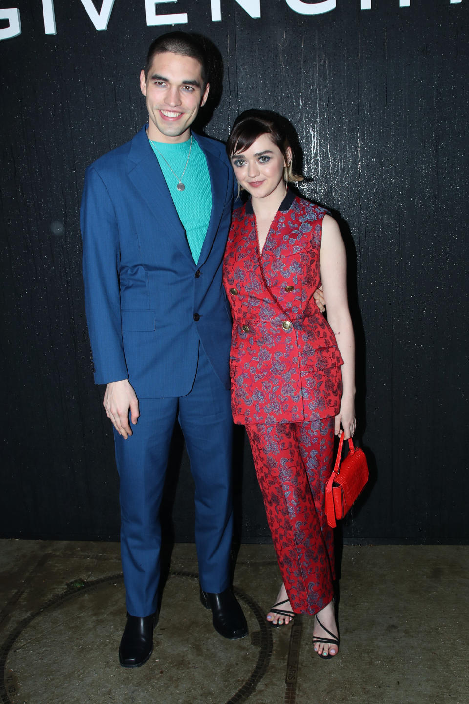 Maisie Williams and Reuben Selby attend the Givenchy fall/winter 2020/2021 show during Paris Fashion Week on March 1.&nbsp;