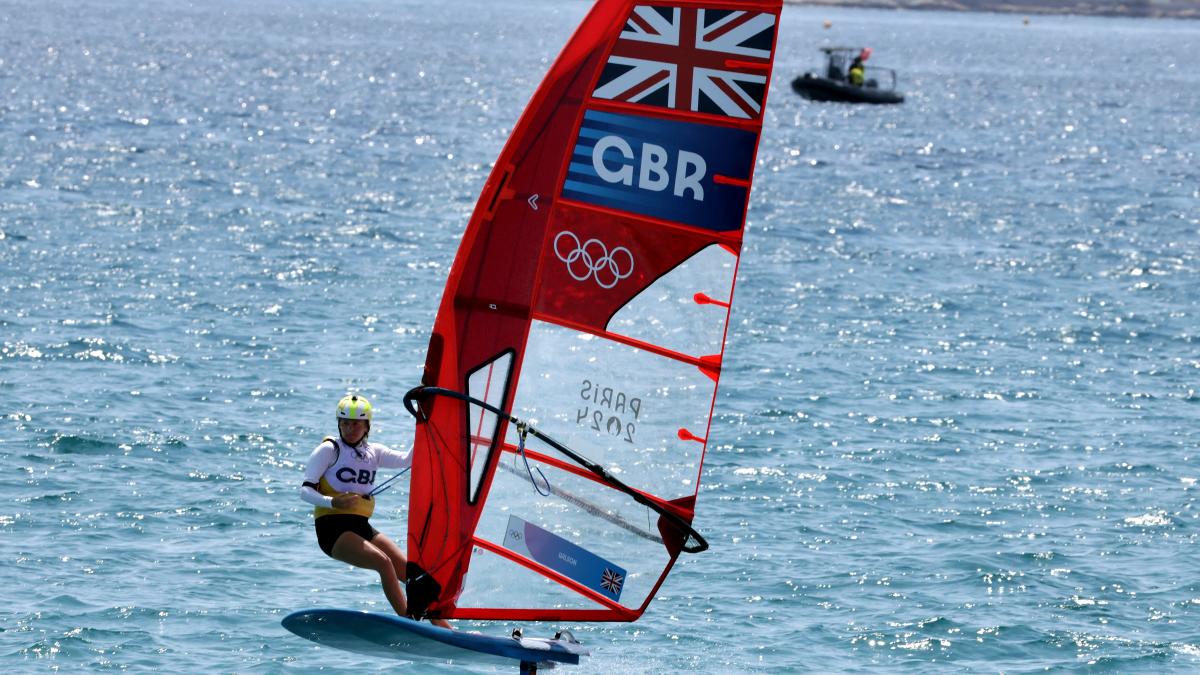 Windsurfer Emma Wilson guaranteed a medal for Great Britain after weather delays