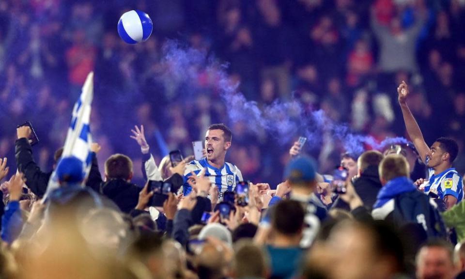 Harry Toffolo celebrates with the Huddersfield fans after their semi-final victory