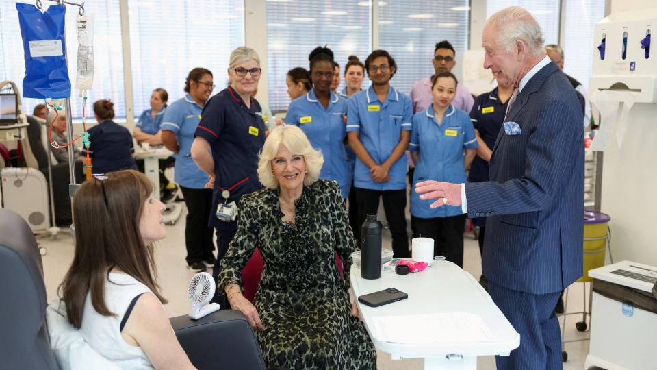 King Charles III and Queen Camilla meet with patient Jo Irons during a visit to the University College Hospital Macmillan Cancer Centre